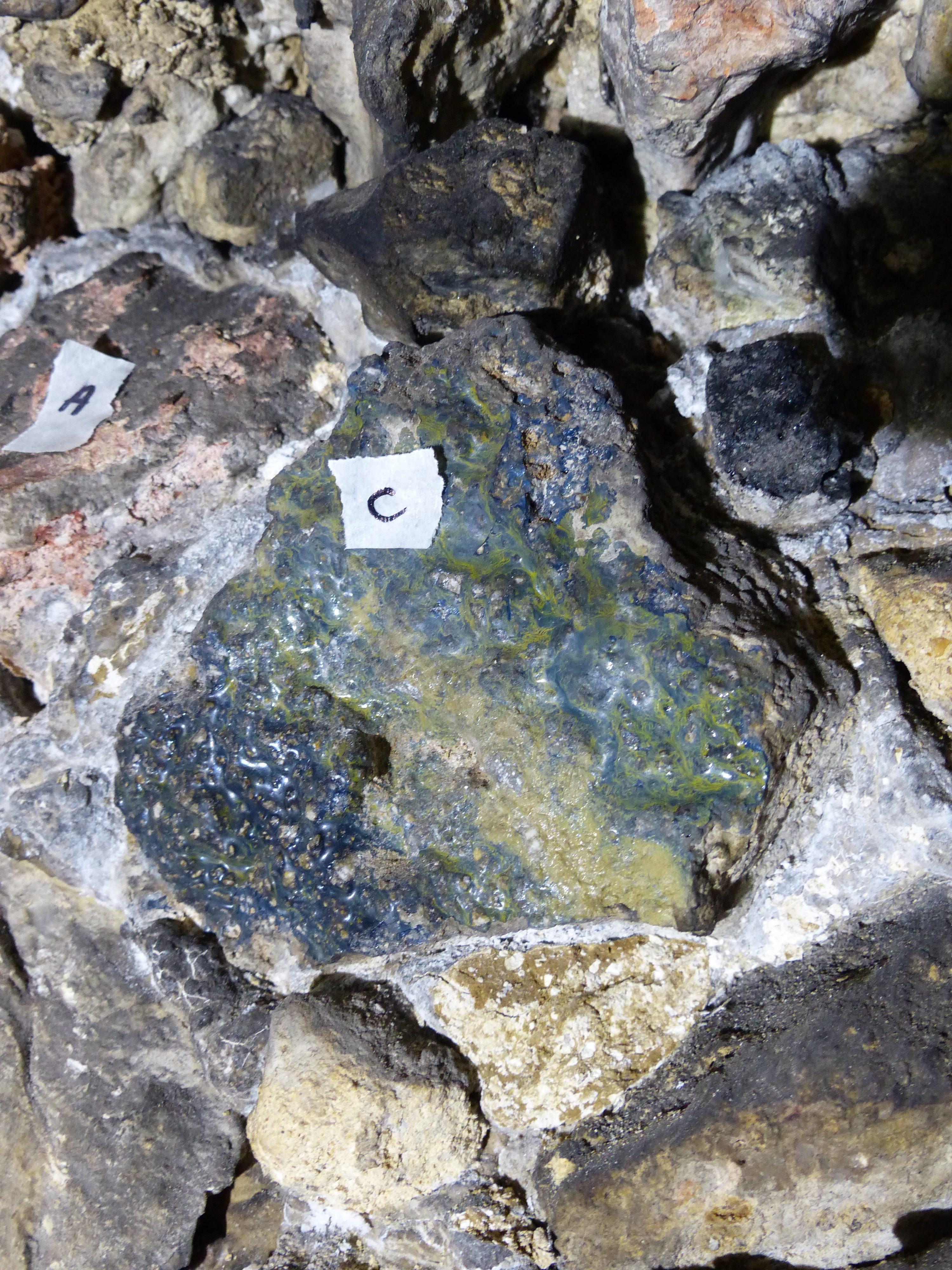 Minerals in the tunnel marked up by a geologist